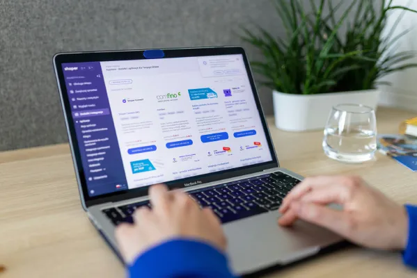 Person using an ecommerce dashboard on a laptop
