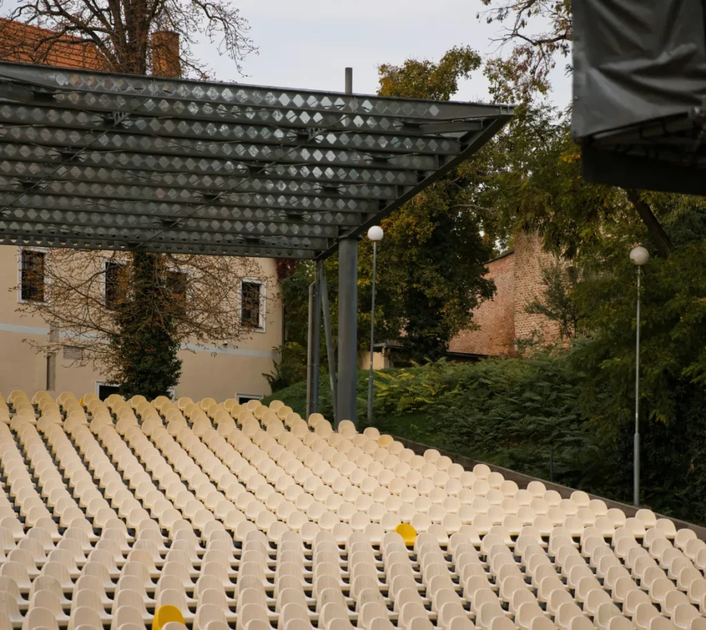Rows of seats at a covered outdoor event venue