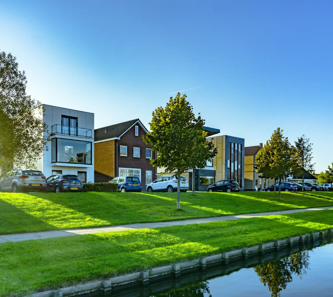 Residential homes beside a landscaped canal